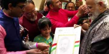 বার্লিনত দেশপ্ৰেমমূলক গান গোৱা শিশুৰ সৈতে তাল মিলালে প্রধানমন্ত্রী মোদীয়ে: