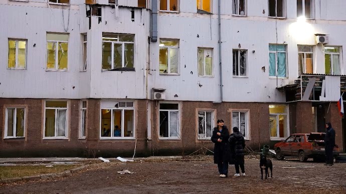 "Deadly Shelling in Donetsk: 13 Killed in Attack on Market District as Russia-Appointed Leaders Blame Ukrainian Forces" 3 Deadly Shelling in Donetsk: 13 Killed in Attack on Market District as Russia-Appointed Leaders Blame Ukrainian Forces"