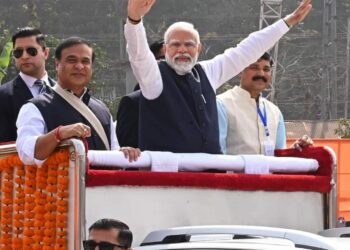 Narendra Modi’s Triumphant Welcome in Assam: A Sea of Supporters Amidst a Shower of Petals